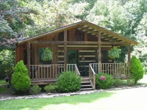 Image of Extremely clean cabin in a quiet setting with an outdoor fire pit.