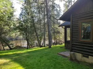 Image of Grayling, MI - Fisherman's Log Cottage on the \"Holy Waters\" of the AuSable River