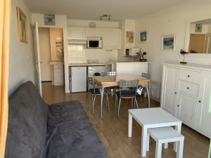 Image of Beachside Getaway: Cozy 2-Bedroom with Balcony, Steps from Sand