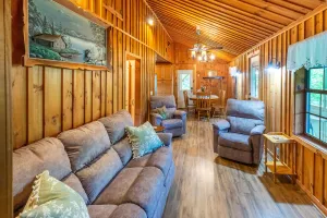 Image of Rustic & wooded wonder w\/ hot tub, wraparound deck, firepit, & fast WiFi