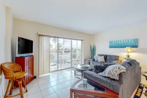Image of Charming and spacious apartment near the beach with inviting patio