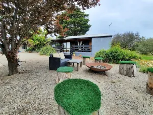 Image of A relaxed fun Cosy Cabin- 5 min from ocean and bay beaches and the Hot springs