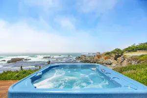 Image of Oceanfront condo w\/ private hot tub, furnished deck & views - walk to beach