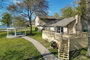 Image of Shared Boat Ramp Waterfront Home in Grove