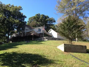 Image of Private country hillside setting surrounded by trees, birds, wildlife pond\/falls