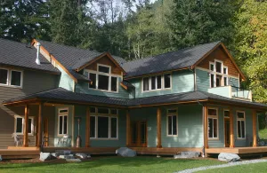Image of Gorgeous five bedroom home sleeps up to 13 guests. Extensive decks wrap the home, fishing pond, 11 acres with forest, pasture, and abuindance of wildlife.