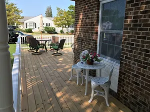 Image of Beautiful corner property with cozy beach vibe.