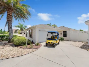 Image of DARLING 2 BEDROOM VILLA WITH ENCLOSED LANAI LARGE BACKYARD AND GOLF CART