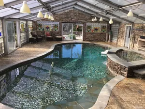 Image of DC Indoor pool will be heated heated March, April and May. Horse farm main level