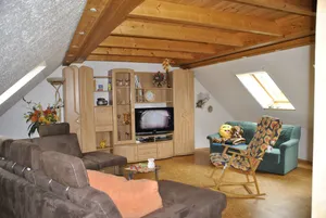 Image of idyllic, sunny apartment at the natural swimming pond and with a fireplace