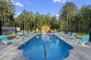 Image of Beautiful cabins with a pool in a peaceful setting