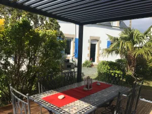 Image of Blue longere by the sea