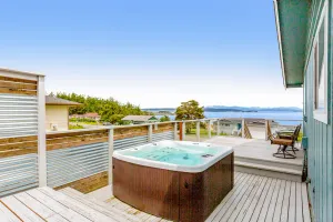 Image of Updated Water View Gem with Deck, BBQ\/Outdoor Dining, Hot Tub, Fireplace, & WiFi