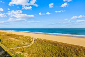 Image of Well-Equipped Family Beachfront Condo w\/Balcony, Views, Washer\/Dryer, A\/C, WiFi