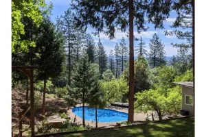 Image of Forest retreat w\/ Pool, Game Room, EV charger. Pet friendly!