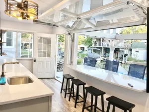 Image of Beautiful cottage with lake access and bonus entertaining space!