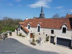 Image of Charming Country House with Flowered Garden, Fireplace, and Nearby Equestrian Shows