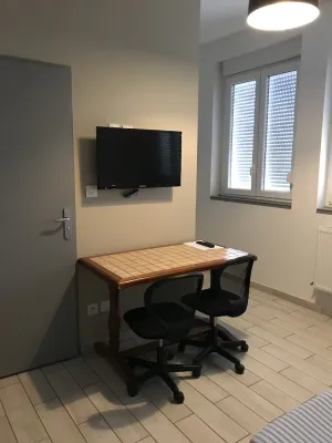 Image of Furnished studio with kitchen