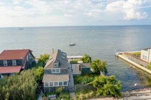 Image of Bay-view apartment with deck, grill, enclosed porch, full kitchen, & WiFi