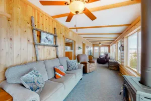 Image of Inviting lake view home with fireplace, golf nearby, full kitchen, & W\/D