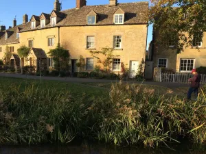 Image of Period cottage in idyllic riverside location in prime Cotswolds village