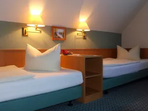 Image of 21 twin rooms - Landhotel Neuwiese with traditional inn An der Mühle