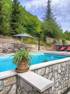 Image of Farmhouse with swimming pool and river nearby