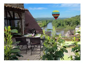 Image of A 14th century Stoneroofed house with a panoramic garden in Beynac.