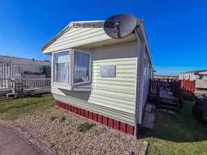Image of Great 6 berth caravan with decking by the beach in Suffolk ref 40023ND