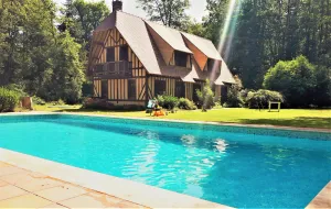 Image of Norman house with pool in the countryside