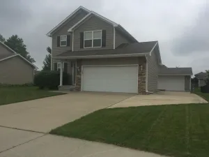 Image of This house is in a quiet neighborhood near major attractions.