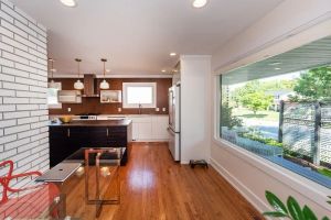 Image of Stylish remodeled home one mile from U of M football stadium with Tesla Charger