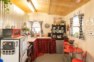 Image of Unique Tiny House with Queen Bed and Hot Tub in country setting.