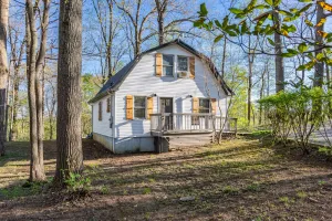 Image of Cozy cottage nestled in the woods bordering beautiful Lake Cumberland