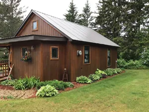 Image of ✨🌌Peaceful riverside cabin in the UP near public beach🌊, 🥾trails & the Porkies!🌲