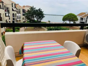 Image of Cozy 2-Room Apartment with Terrace, Pools & Lake View - Optional AC, Fitness, Parking Included
