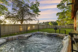 Image of 2Br Cabin with hot tub, BBQ, 55\" Smart TV, W\/D.