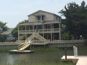 Image of Walk to beach, wraparound porch, new boat dock, water on two sides,  Cargo Lift
