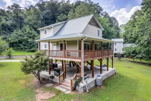 Image of Riverfront gem w\/wraparound deck, horseshoes, firepit, hot tub, WiFi - 2 dogs OK