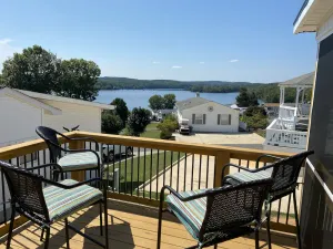 Image of Phoenix Tiny House at Badin Shores Resort, lake view, porch, pool, beach, marina