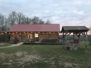 Image of Rustic Log Cabin on private land, with ample gravel roads for horses and ATV’s.