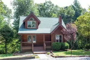 Image of Cozy cabin in private gated community with Hot Tub!