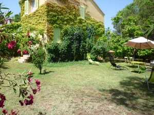 Image of House and garden near sea, mountain and river