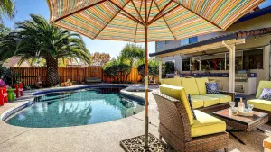 Image of Wine Country Retreat.  Large backyard with pool\/spa, outdoor kitchen & fireplace