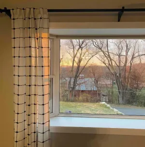 Image of Cheerful two bedroom home in quiet neighborhood. Sun Porch ~ Patio ~  Large yard