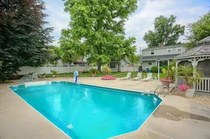 Image of IN-GROUND POOL, Large Private Fenced Yard, Dining Gazebo, Outdoor Kitchen\/Bath