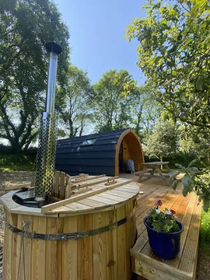 Image of Wild Luxury Bluebell Glamping Pod with Wood Fired Hot Tub in quiet rural setting