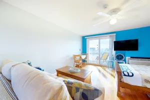 Image of 2nd-floor studio 1 block from the beach with pool, beach access, grills, & W\/D