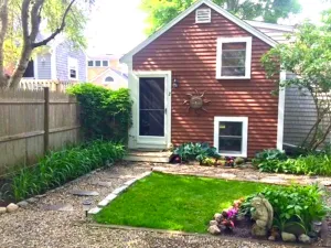 Image of 2 Minute Walk to Beach • Pet Friendly • Romantic Cottage - A\/C, fenced yard
