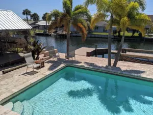 Image of Waterfront 4 bed 3 bath steam sauna pool tiki bar Heated Pool to 70 Hot Tub